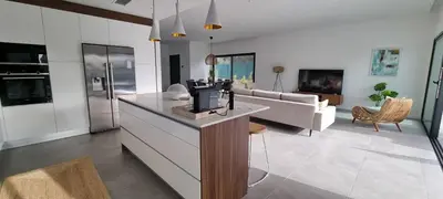a kitchen and living room with a tv on a counter at Valverde 2 Villa, Vilamoura, Algarve, only 5 minutes from Marina, Golf and Beach in Vilamoura