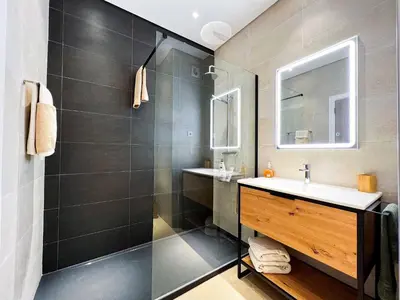 a bathroom with a sink and a shower at Luxury Condo in Top Complex with Ocean and Marina View by Be Cherish in Albufeira
