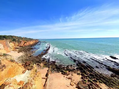 a view of a beach with rocks and the ocean at Luxury Corcovada by BeCherish in Albufeira