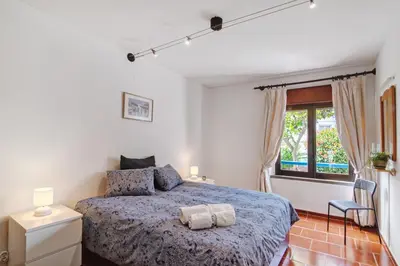 a bedroom with a bed and a window at Apartment Mar Azul 1 in Albufeira