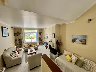 a large living room with a couch and chairs at Albufeira Sunset With Pool by Homing in Albufeira
