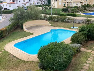 an overhead view of a swimming pool in a yard at Penthouse T2 pool Terrace time in Albufeira