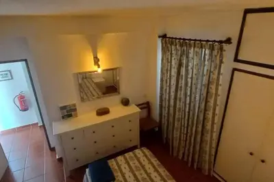 a bathroom with a sink and a mirror at Bela Vista Algarve in Albufeira
