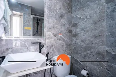 a bathroom with a sink and a toilet at #266 Luxurious Villa Bellagio in Albufeira