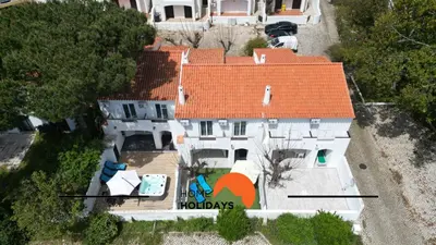 an aerial view of a large white house with an orange roof at #266 Luxurious Villa Bellagio in Albufeira
