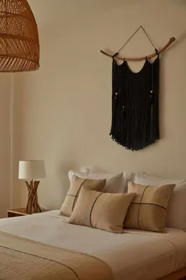 a bedroom with a bed with a black curtain on the wall at Casa Terra with Pool & Free WiFi in Albufeira