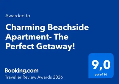 a screenshot of a cell phone with the text upgraded to channel beaching beached at Charming Beachside Apartment- The Perfect Getaway! in Albufeira