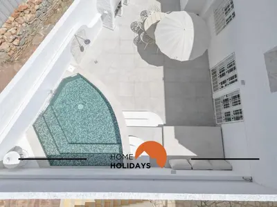 a view of a mosque with a sign that says have holidays at #128 Number 10 Villa by Home Holidays in Albufeira